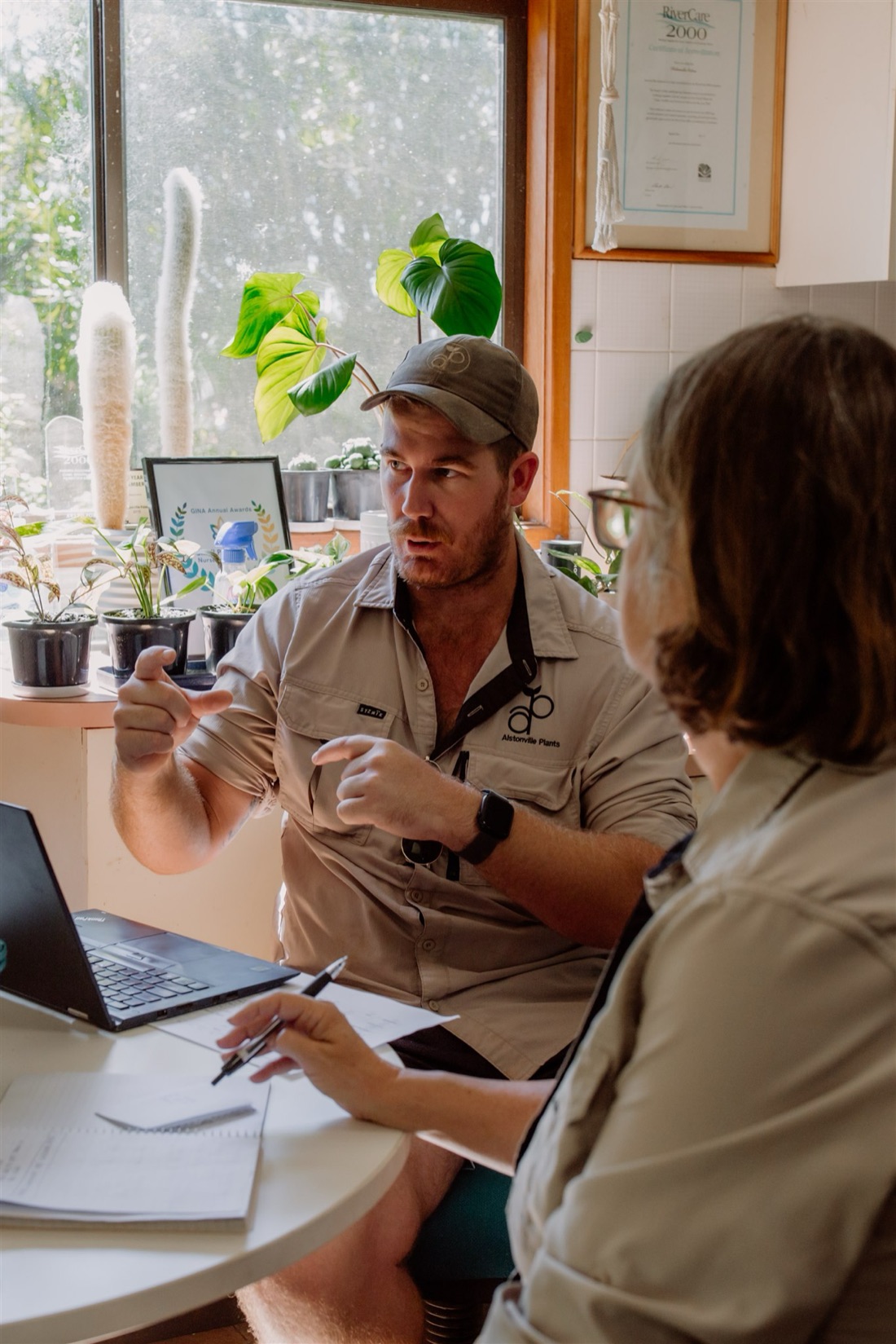 Talking through a plant schedule at the nursery